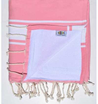 Pink and white sponge beach towel