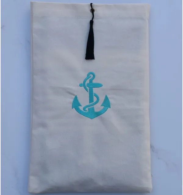 Pouch light beige embroidered with turquoise anchor pattern with black pompom Fouta Tunisia - 1