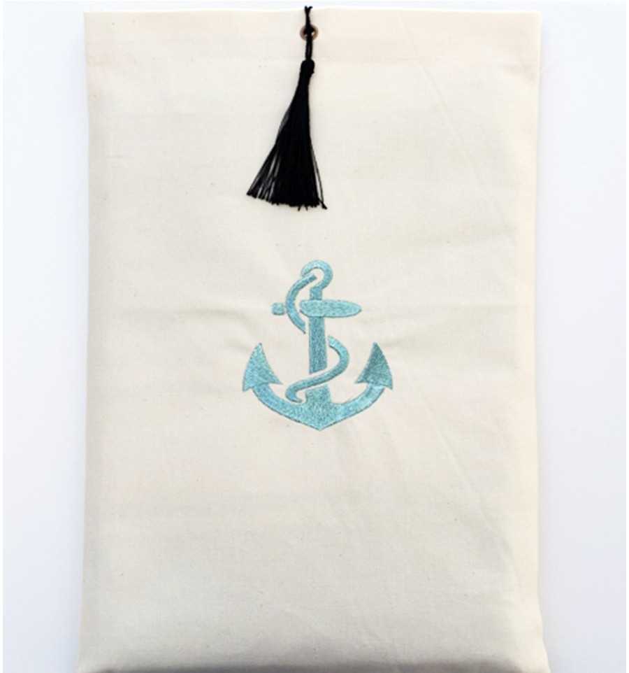 Pouch light beige embroidered with turquoise anchor motif and pompom Fouta Tunisia - 1