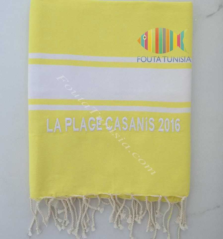 Personalized yellow beach towel the beach CASANIS Spain 