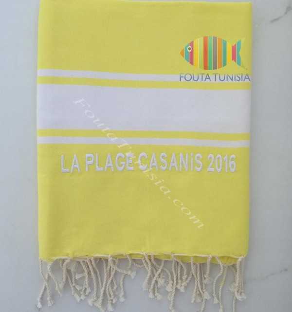 Personalized yellow beach towel the beach CASANIS Spain 