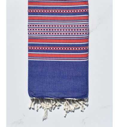 blue jeans and red arabesque beach towel