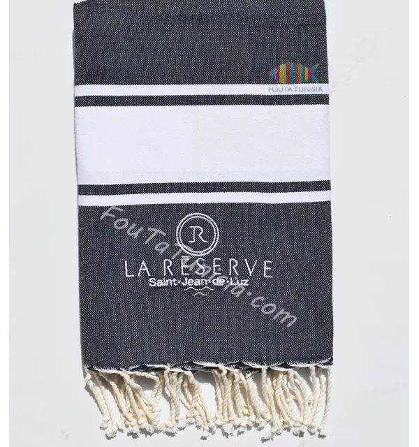 Midnight blue beach towel embroidered The reserve 