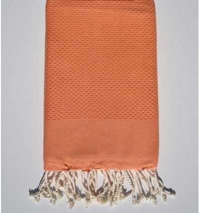 Plain tangerine orange beach towel